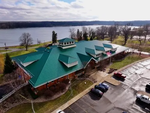 Tarping and dry-in on a Sagamore commercial roof
